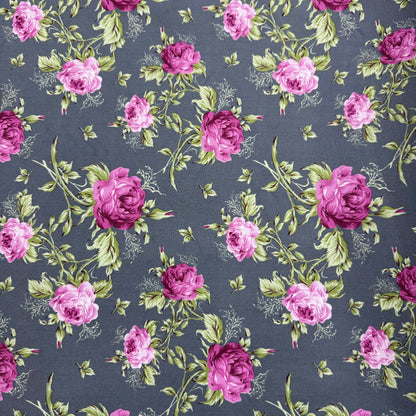 Pattern of pink and purple roses on a dark blue background